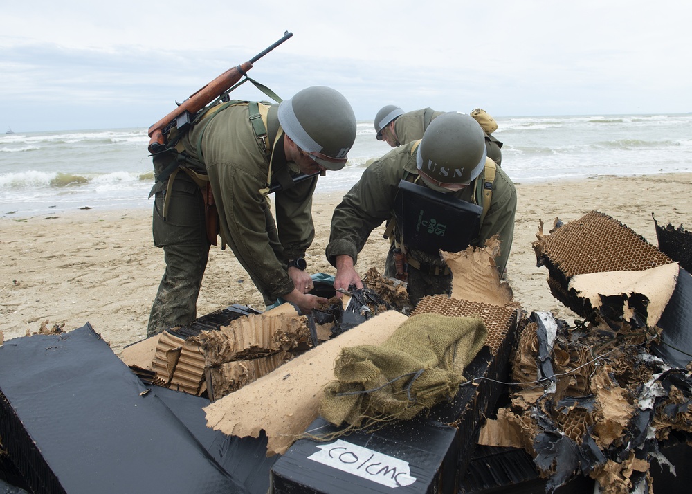 U.S. Navy SEALs reenact D-Day beach clearing on Utah Beach.