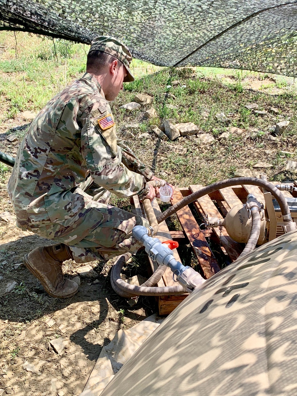 Soldier collects water to test quality at Strike Back 19