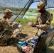 Soldiers test water before distributing to hundreds of Soldiers at Strike Back 19