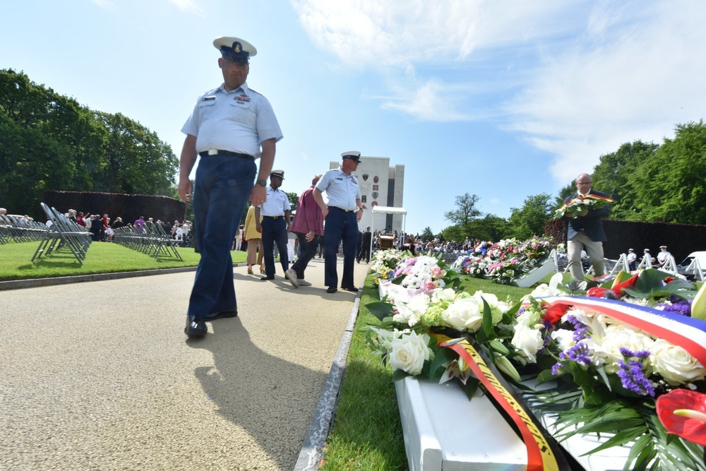 Eagle Coast Guard women and men attend a memorial ceremony at the Ardennes American Cemetery in Belgium