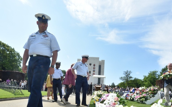 Eagle Coast Guard women and men attend a memorial ceremony at the Ardennes American Cemetery in Belgium