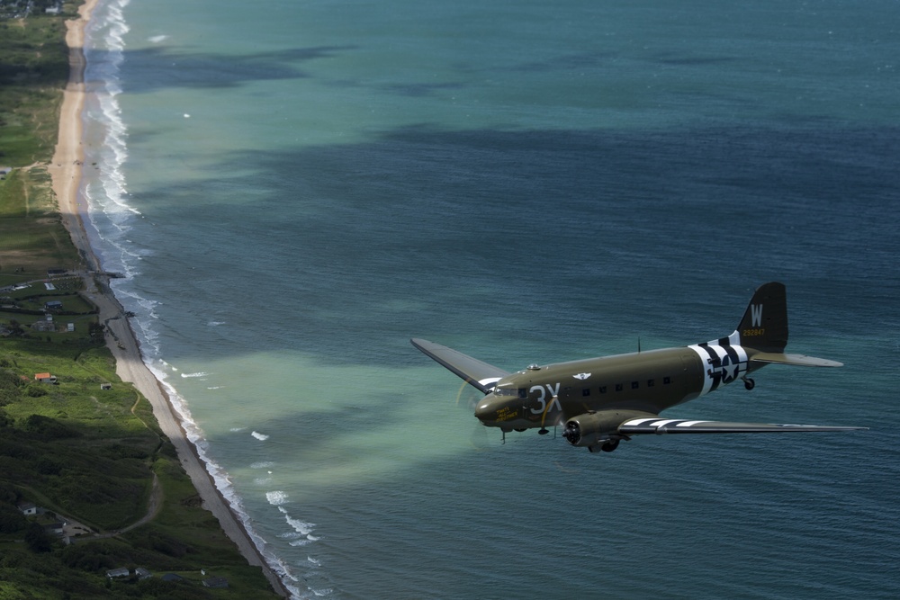 D-Day C-47, Heritage C-130J fly over Normandy