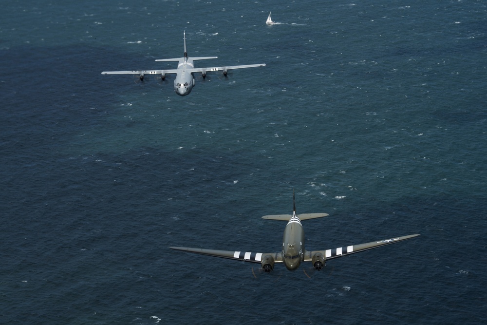 D-Day C-47, Heritage C-130J fly over Normandy