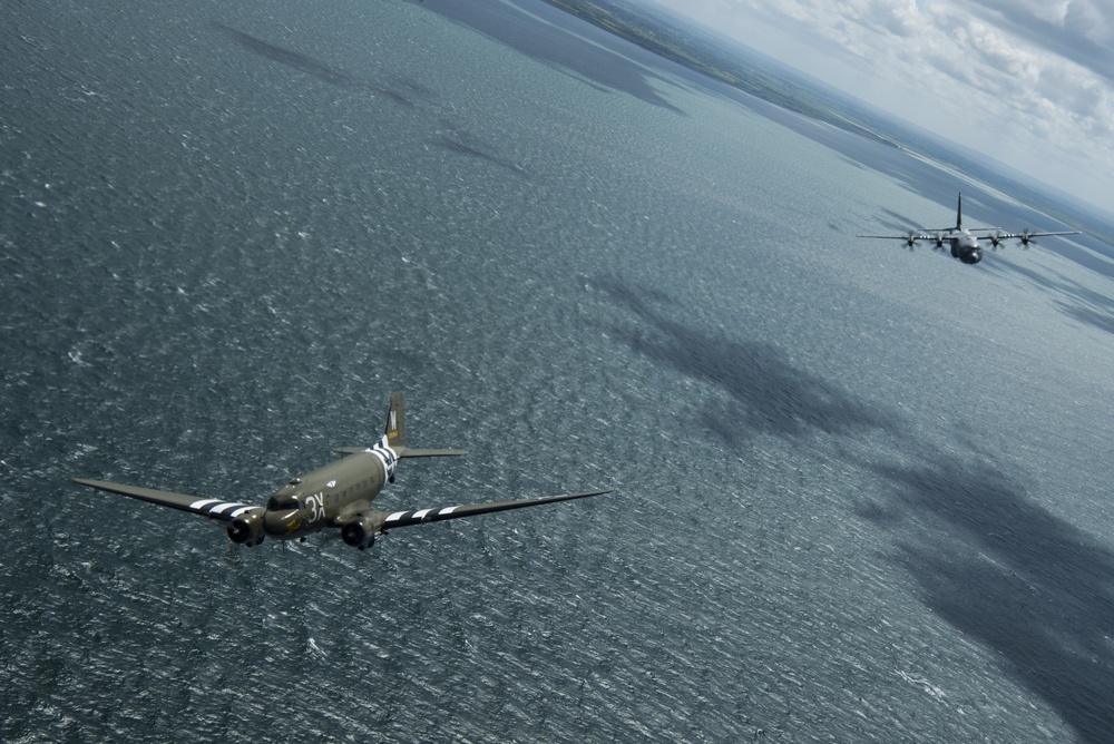 D-Day C-47, Heritage C-130J fly over Normandy