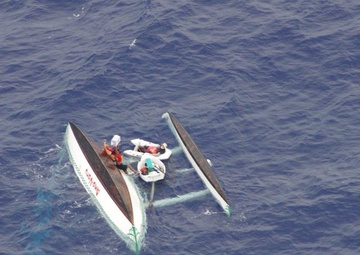 Imagery Available: 3 men off Yap rescued from capsized sailing canoe