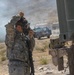 Idaho Army National Guard Soldiers from the 145th Brigade Support Battalion, 116th Cavalry Brigade Combat Team, don protective masks