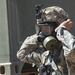 Idaho Army National Guard Soldiers from the 145th Brigade Support Battalion, 116th Cavalry Brigade Combat Team, don protective masks