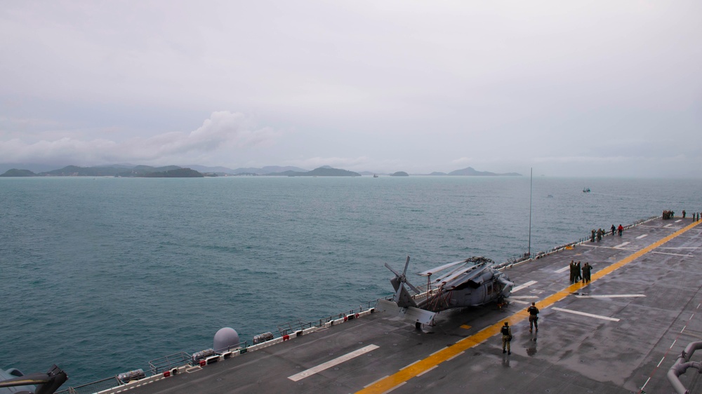 USS Boxer (LHD 4) anchors off the coast of Phuket, Thailand