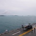 USS Boxer (LHD 4) anchors off the coast of Phuket, Thailand