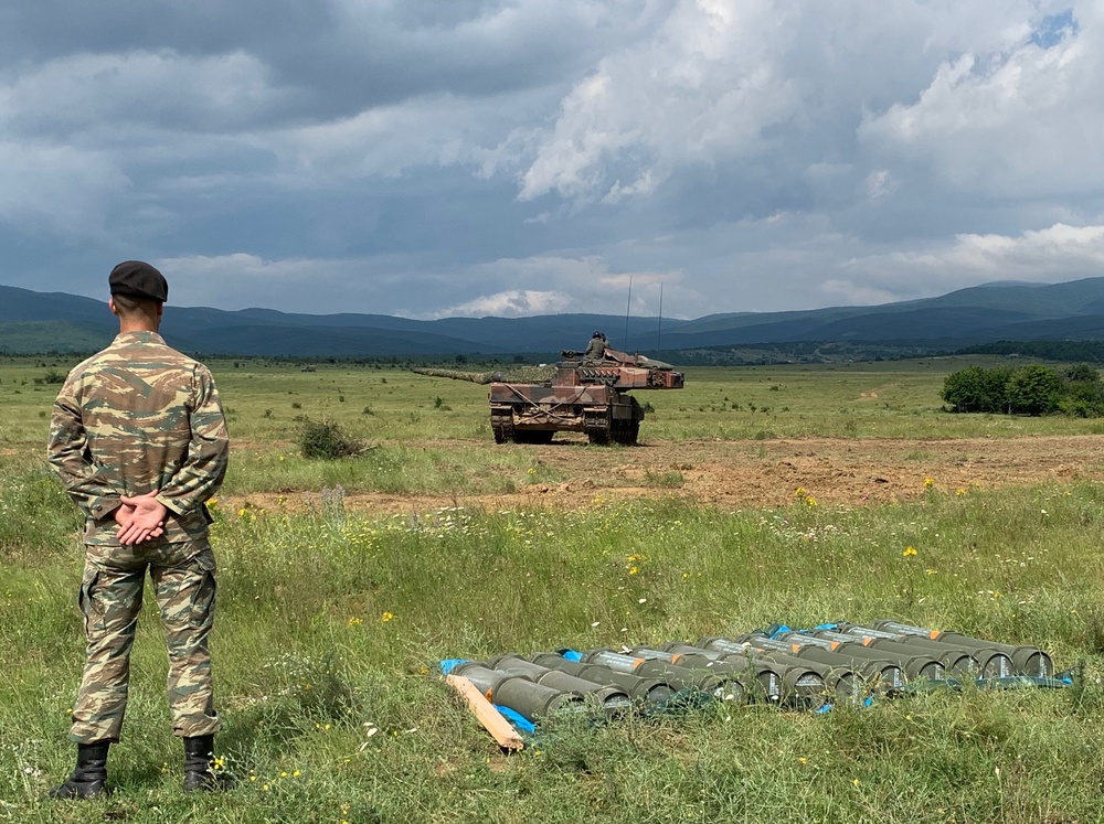 Greek Soldier guards tank rounds