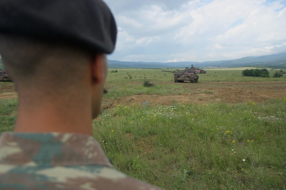 Bulgarian Land Forces fire 120mm tank rounds during STRIKE BACK 19