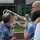 Little boy plays trombone