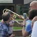 Little boy plays trombone
