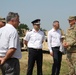 Key leaders from 141st MEB and Romania walk through military facility