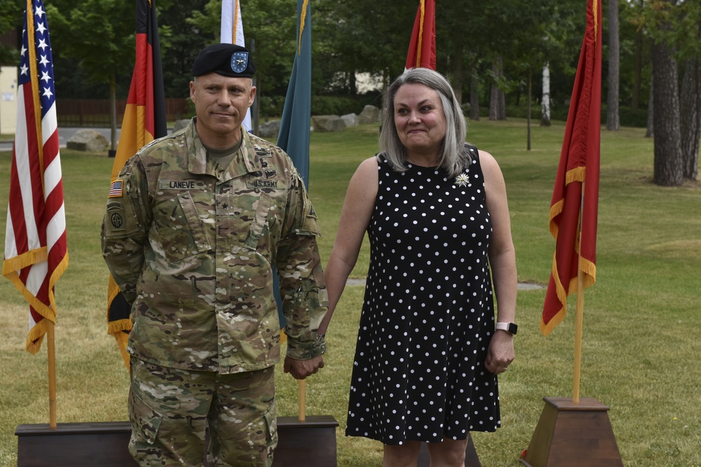 Brig. Gen. Christopher LaNeve holds wife, Kimberly’s hand