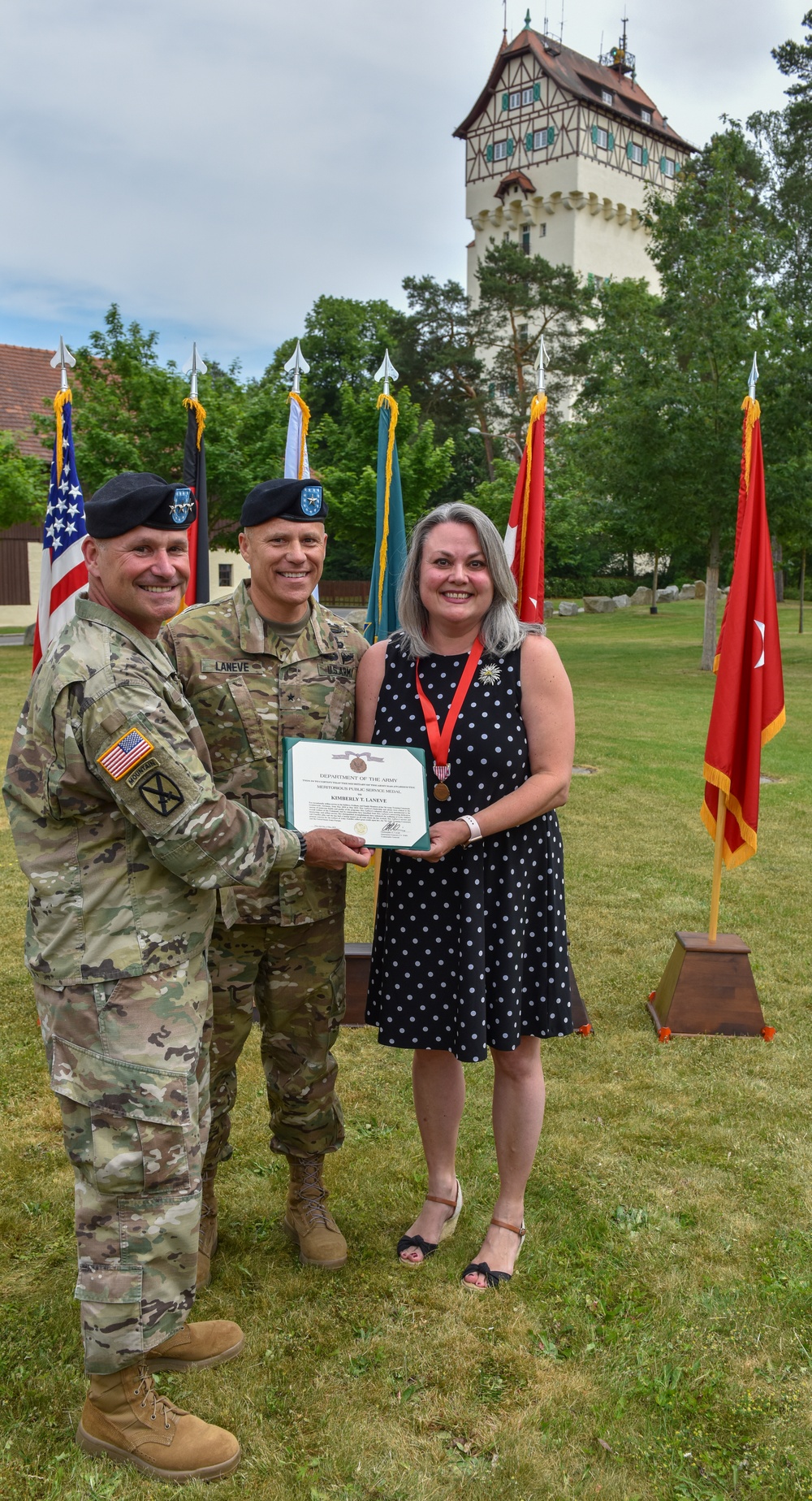 Lt. Gen. Christopher Cavoli awards Kimberly LaNeve with the Meritorious Public Service Medal