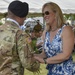 Kathryn Norrie receives flowers at 7th ATC’s Change of Command ceremony