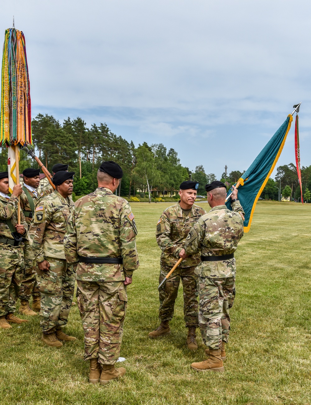 Brig. Gen. Christopher LaNeve passes 7th ATC colors to Lt. Gen. Christopher Cavoli in Change of Command ceremony