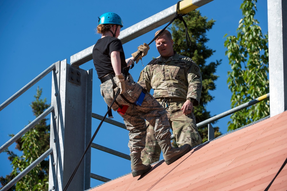 Air Force Junior Reserve Officer Training Corps (AFJROTC) participate in the Cadet Summer Leadership Course at JBER