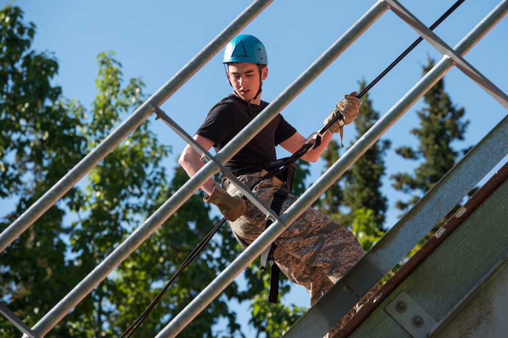 Air Force Junior Reserve Officer Training Corps (AFJROTC) participate in the Cadet Summer Leadership Course at JBER