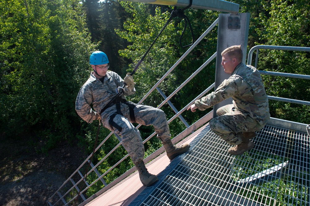 Air Force Junior Reserve Officer Training Corps (AFJROTC) participate in the Cadet Summer Leadership Course at JBER