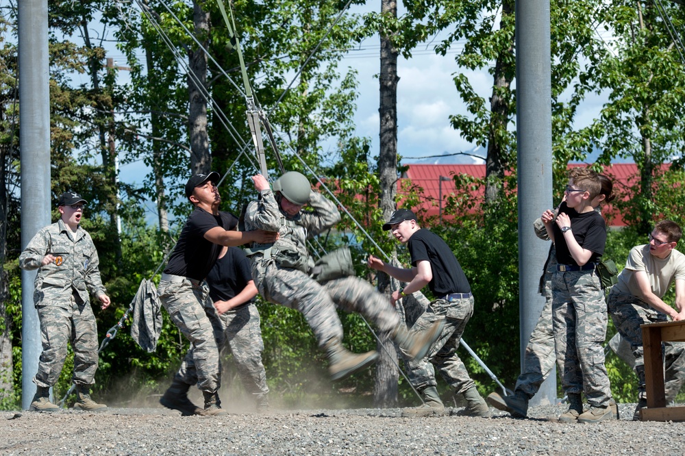 Air Force Junior Reserve Officer Training Corps (AFJROTC) participate in the Cadet Summer Leadership Course at JBER