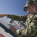 Nimitz Sailor Performs Maintenance On Jet Lockers