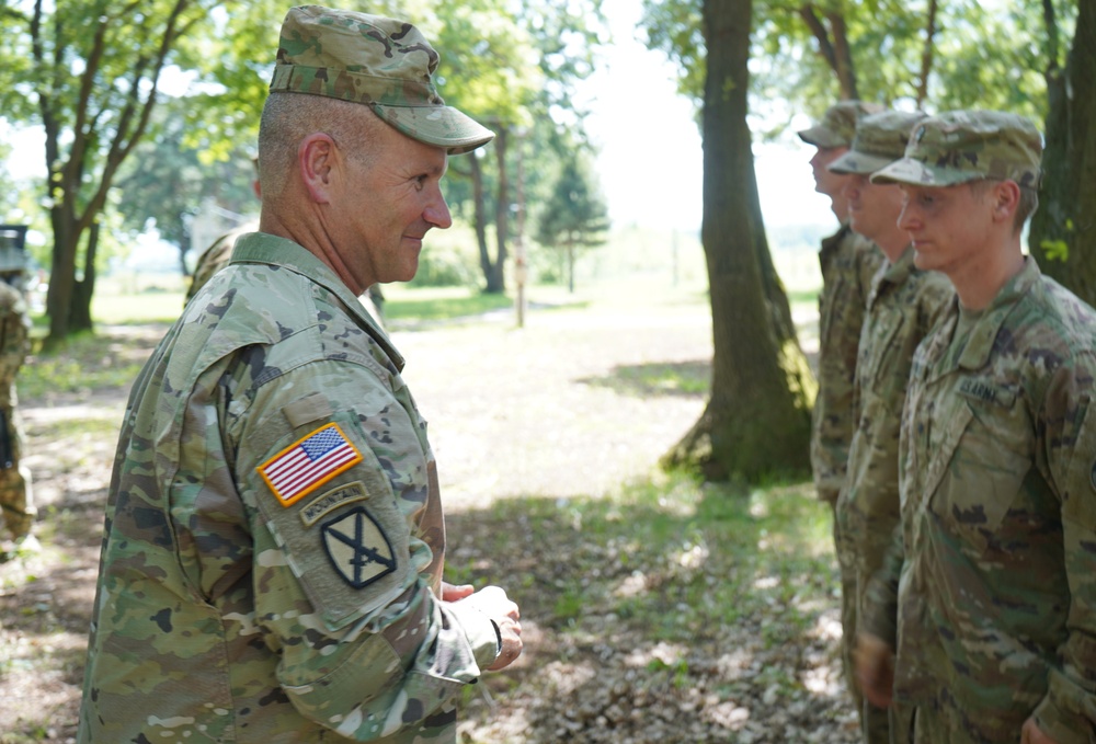 Lt. Gen. Christopher G. Cavoli’s coin presentation during SG19