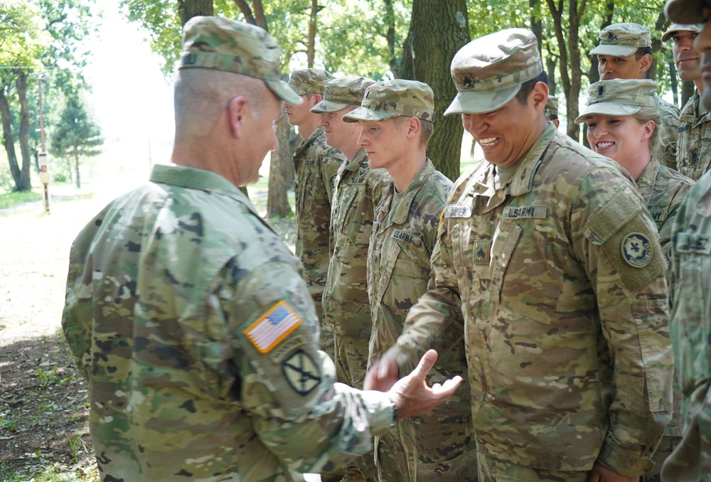 Lt. Gen. Christopher G. Cavoli’s coin presentation during SG19