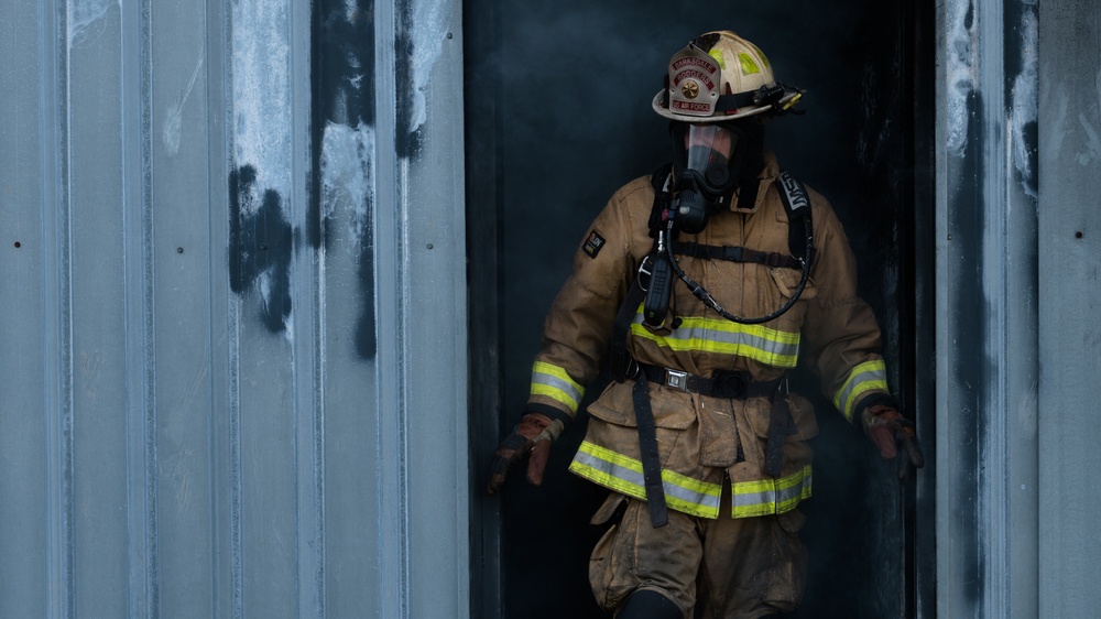 Barksdale firefighters practice putting out flames