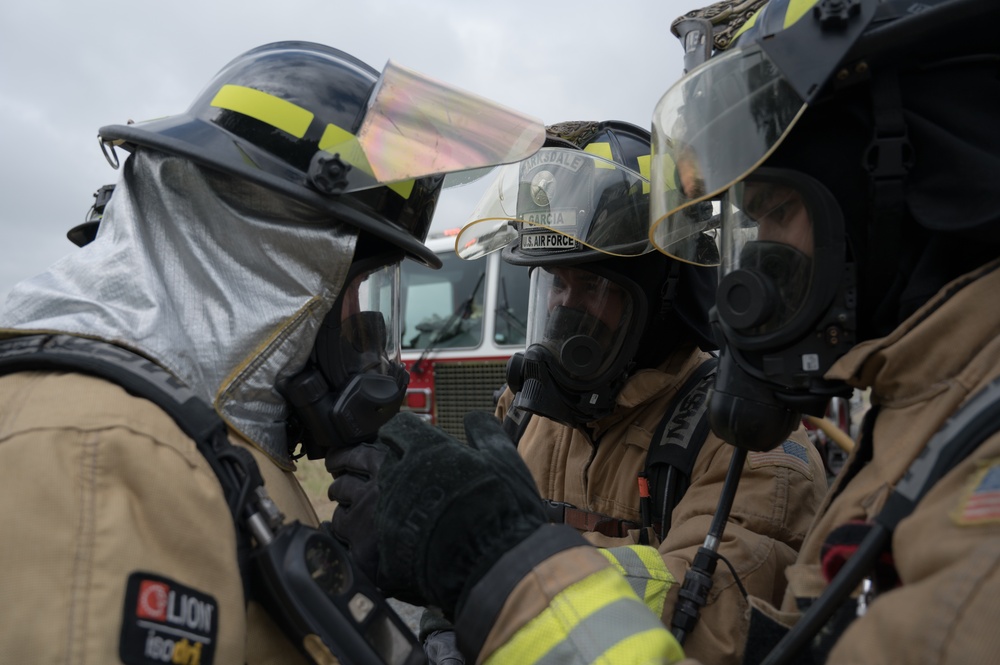 Barksdale firefighters practice putting out flames