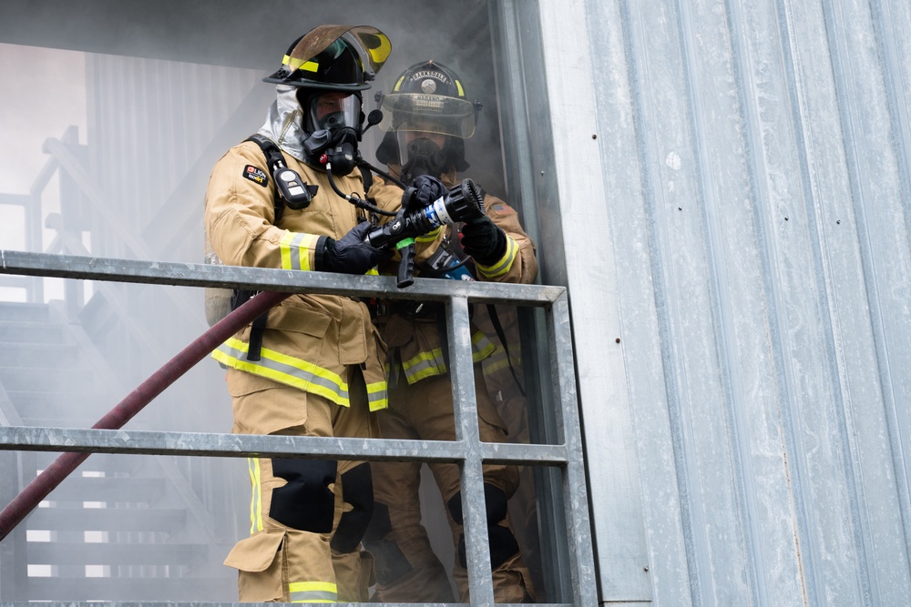 Barksdale firefighters practice putting out flames