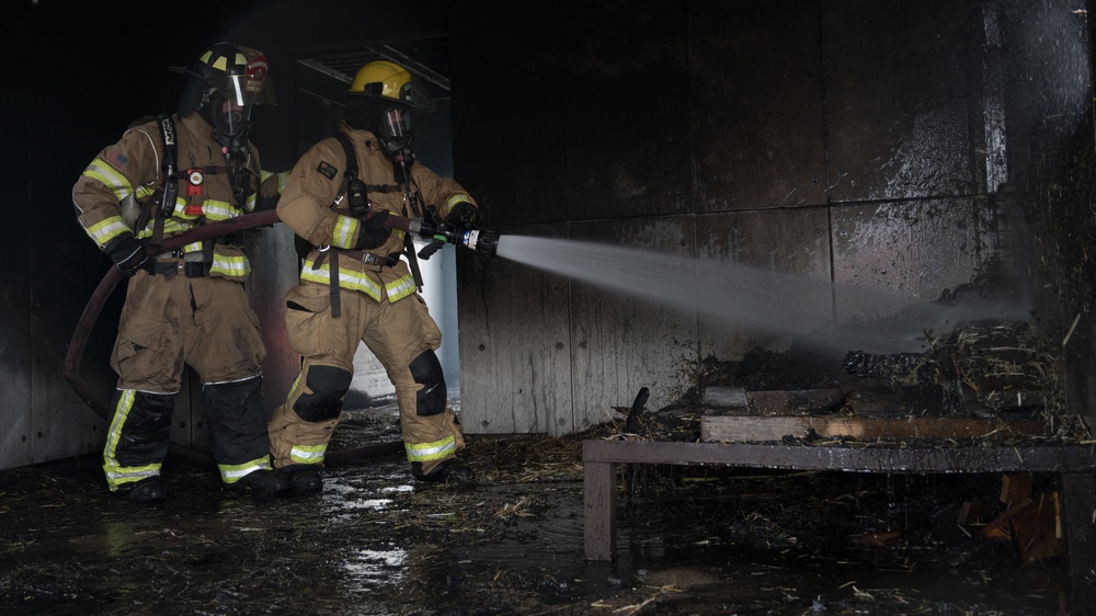 Barksdale firefighters practice putting out flames