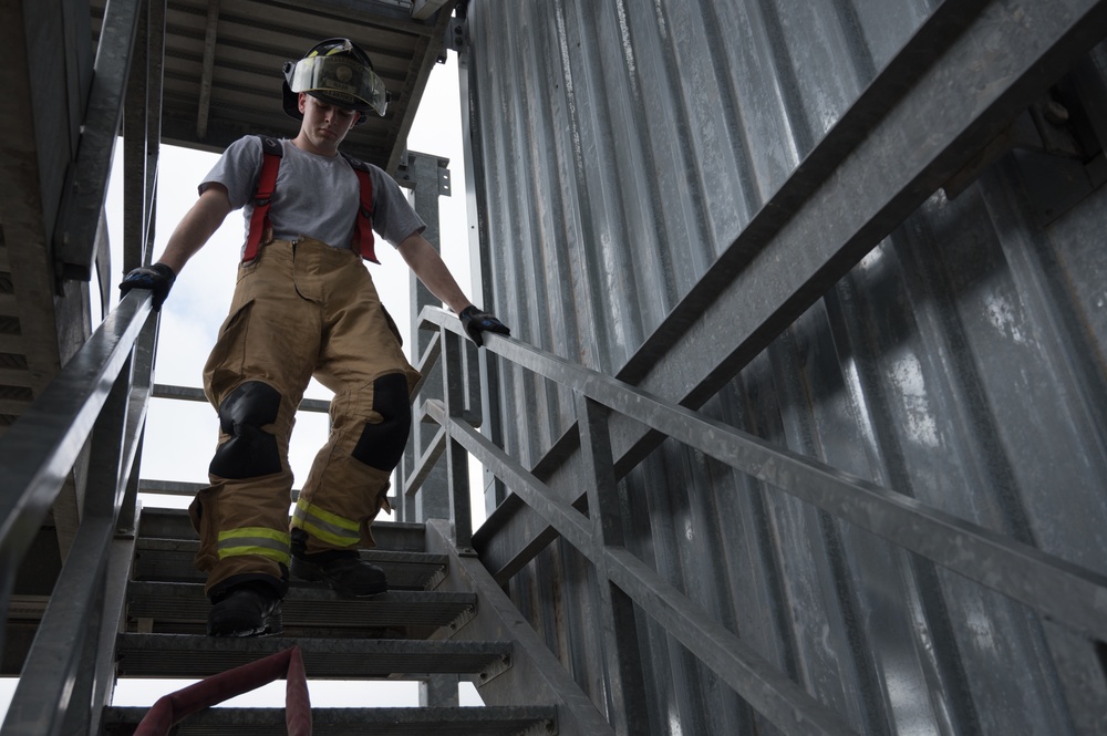 Barksdale firefighters practice putting out flames