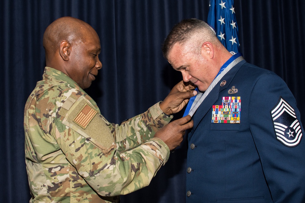 Chief Master Sgt. Jesse Kimsey receives the Drennan A. Clark-Order of Nevada Medal