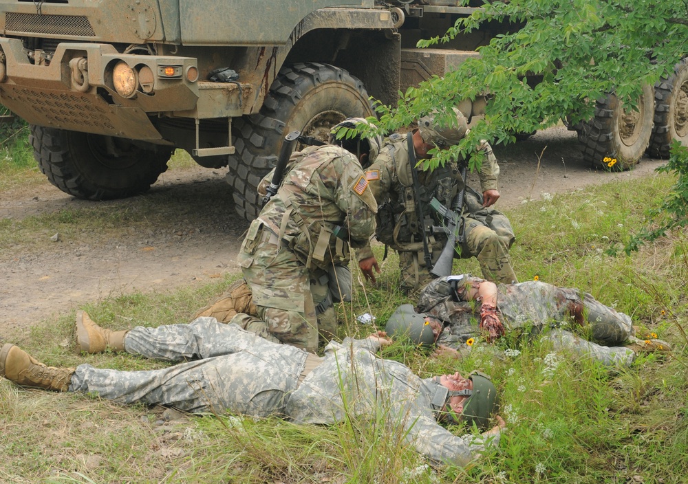 Oklahoma National Guard Soldiers perform first aid training at Fort Chaffee, Arkansas during Western Strike