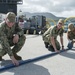 USS Asheville Sailors performs maintenance