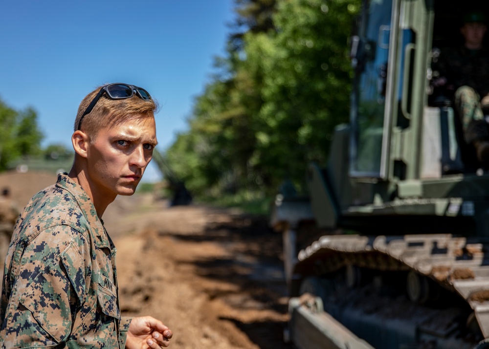 U.S. Marines with MWSS-471 build a roadway at Canadian Forces Base Cold Lake