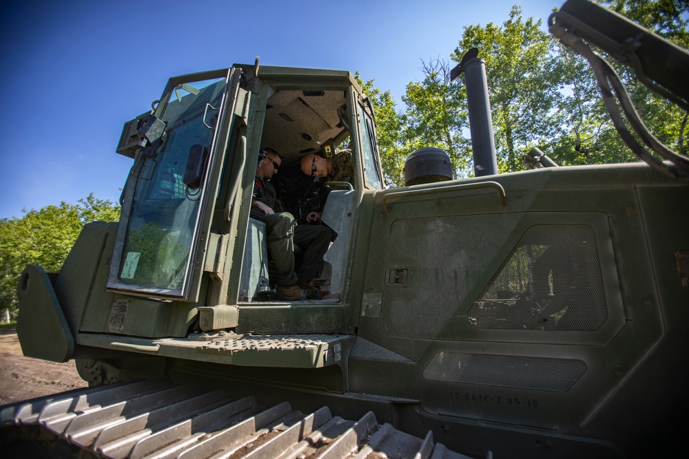 U.S. Marines with MWSS-471 build a roadway at Canadian Forces Base Cold Lake