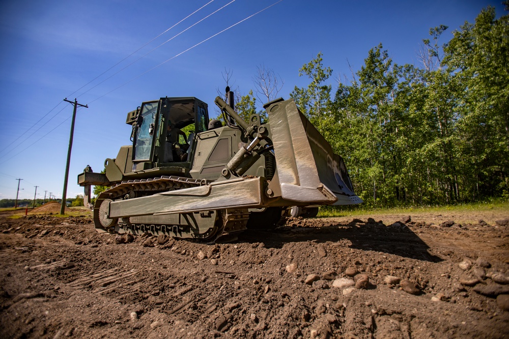 U.S. Marines with MWSS-471 build a roadway at Canadian Forces Base Cold Lake