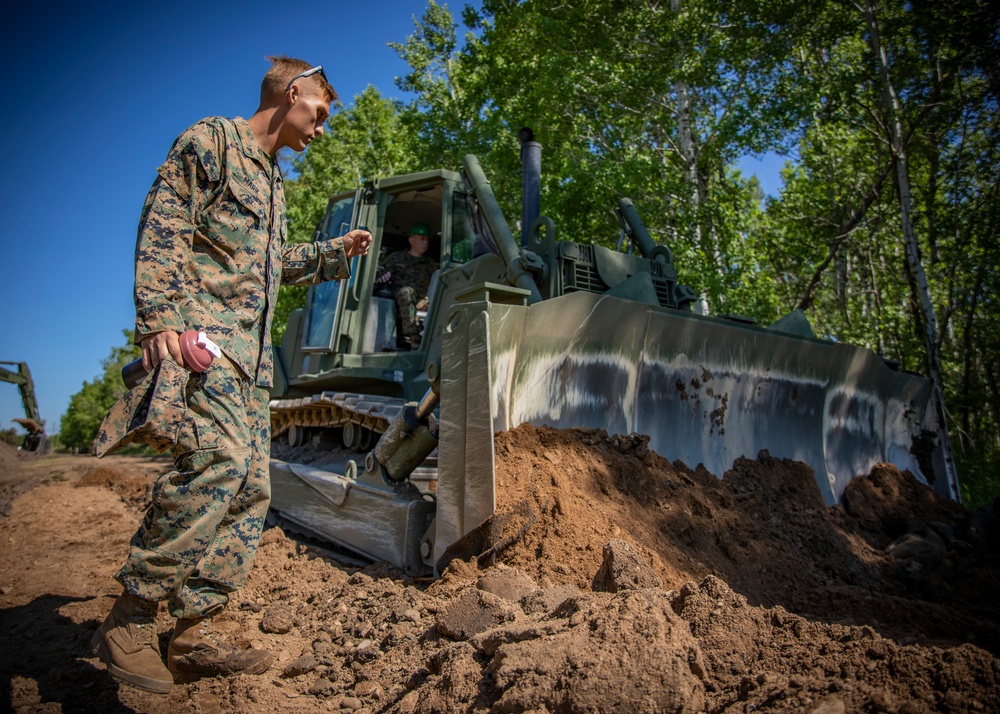 U.S. Marines with MWSS-471 build a roadway at Canadian Forces Base Cold Lake