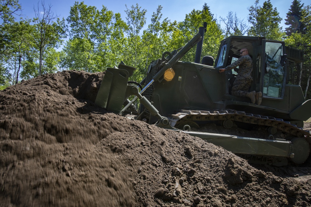 U.S. Marines with MWSS-471 build a roadway at Canadian Forces Base Cold Lake