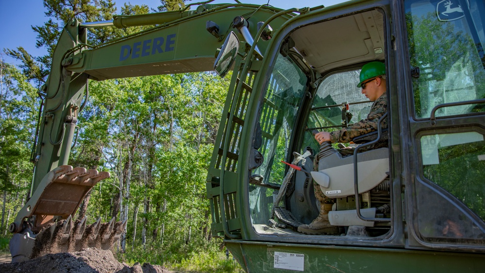 U.S. Marines with MWSS-471 build a roadway at Canadian Forces Base Cold Lake