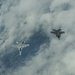 F-35s fly with Finnish F-18s