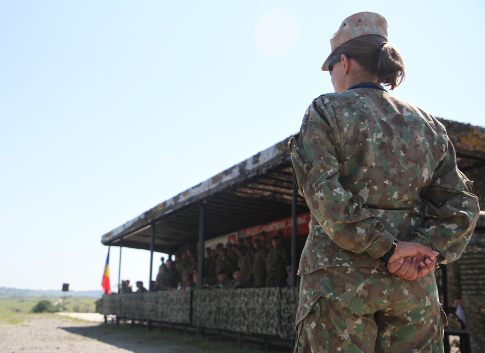 A Romanian Soldier overlooking distinguished visitors and media during Media Day on Cincu Training Area, as part of Saber Guardian 19.