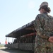 A Romanian Soldier overlooking distinguished visitors and media during Media Day on Cincu Training Area, as part of Saber Guardian 19.