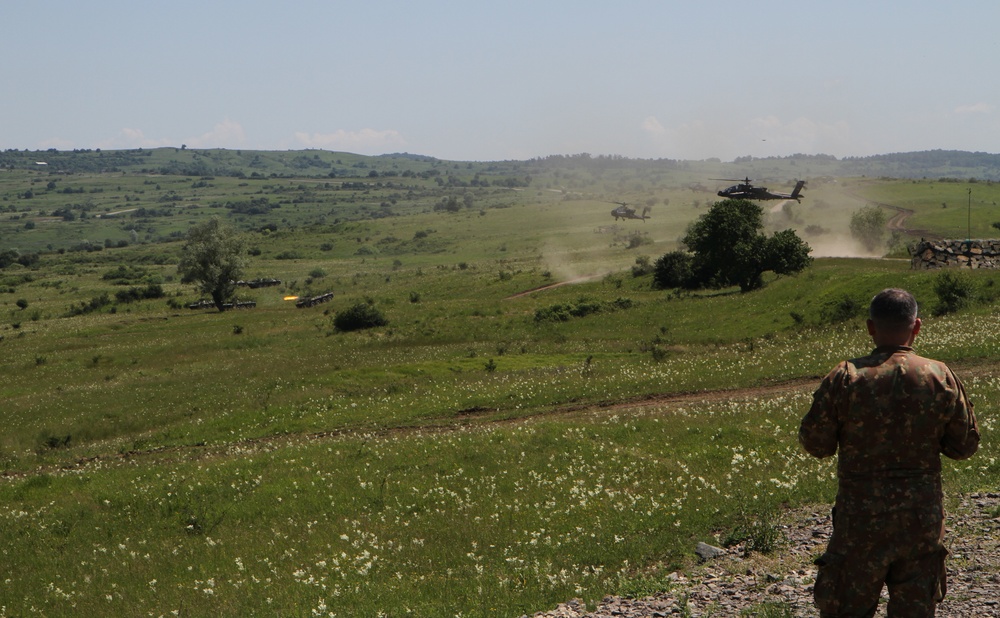 American and Romanian forces train together during a live fire exercise for Media Day on Cincu Training Area, as part of Saber Guardian 19.