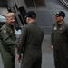 U.S. Navy Rear Adm. Roy Kelley shakes hands with Capt. Randy Peck
