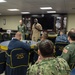 U.S. Navy Rear Adm. Roy Kelley and Force Master Chief Huben Phillips speak to Sailors
