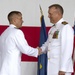 Dotson and McFarland shake hands during VX-30 change of command